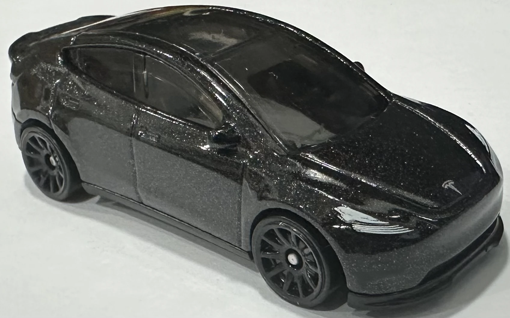 2024 Hot Wheels 	Tesla Model Y Black - Mainline 015/250 - Green Speed 3/10