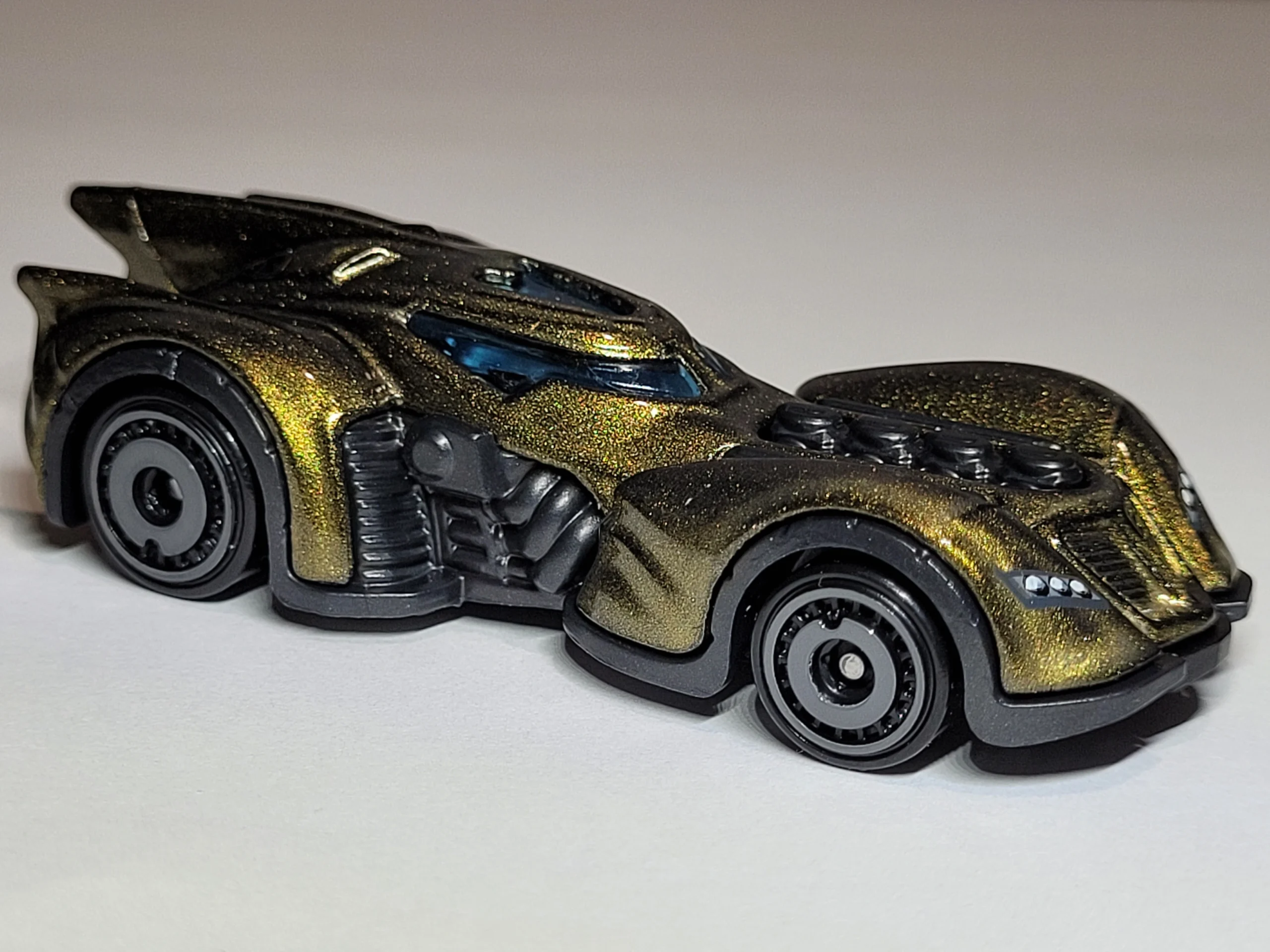 2025 Batman Arkham Asylum Batmobile Olive - Mainline 054/250 - Serie 2/5